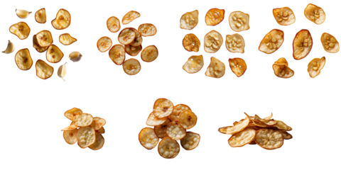fried garlic chips arranged in various groups on a transparent background showcasing different sizes and shapes of the crunchy snack with hints of whole garlic cloves