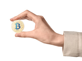 Female hand holding golden bitcoin on white background