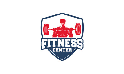 Strong figure lifting weights, a fitness center .