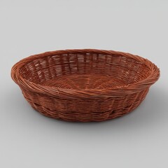 Fototapeta premium Shallow, round, reddish-brown wicker basket with tightly woven strands and a slightly flared rim