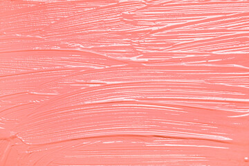 Texture of coral oil paint strokes as background, closeup