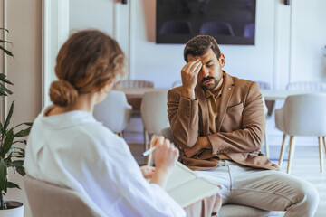 Man Seeking Counseling While Discussing Problems in a Comfortable Office Setting