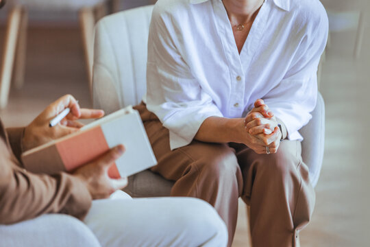 Counseling Session with Client and Therapist in Calm Office Setting