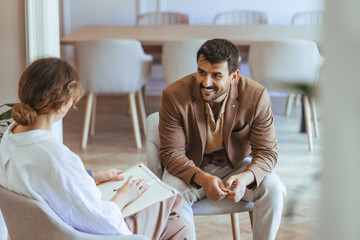 Professional Dialogue Between Two Individuals in a Modern Office Environment