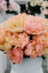 bouquet of yellow and orange peonies, floral background	