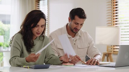 Couple overwhelmed by overdue bills and low income, facing economic stress and inflation-related financial crisis - Powered by Adobe