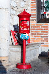 Red mailbox for santa claus is waiting for children's letters in asturias, spain