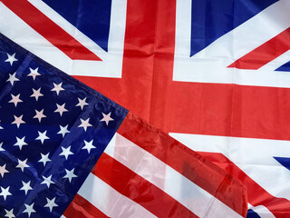 United States of America and United Kingdom flag top view background. Political and conflict...