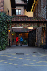 Tourists visiting typical rural hotel in asturias during christmas time