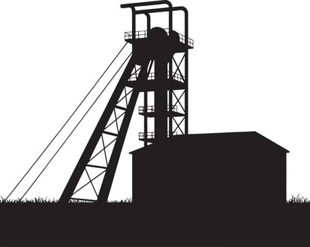 Silhouette of a mine headframe and building industrial landscape.