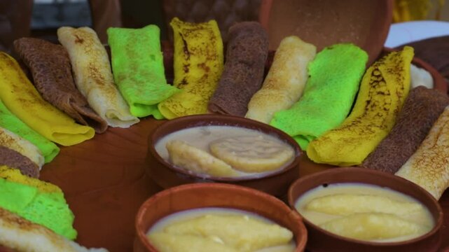 Traditional Bengali Pitha Sweets with Rice Flour, Coconut, and Nalen Gur