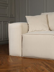 This Modern Minimalist Beige Upholstered Sofa features Soft Cushions for optimal comfort and style