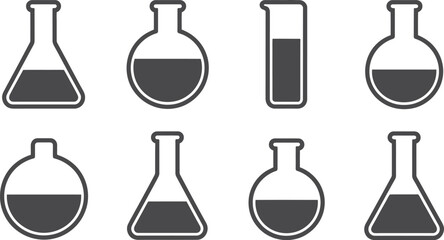 A collection of laboratory glassware including flasks and test tubes filled with a dark liquid on white