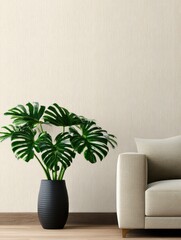 Modern living room featuring a stylish sofa and a vibrant potted plant against a neutral wall