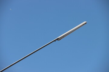 street lamp on blue sky