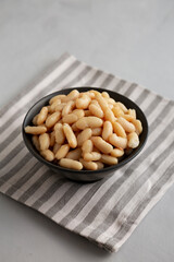 Organic Cannellini Beans in a Bowl, side view.