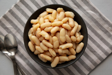 Organic Cannellini Beans in a Bowl, top view.