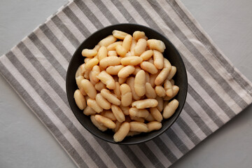 Organic Cannellini Beans in a Bowl, top view. Flat lay, overhead, from above.