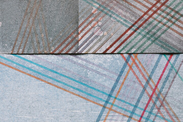 Colorful stripes on gray paper, grunge background
