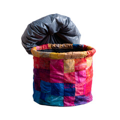 Colorful patchwork eco-friendly trash bin made from recycled fabrics and plastics with drawstring liner, empty, isolated on transparent background