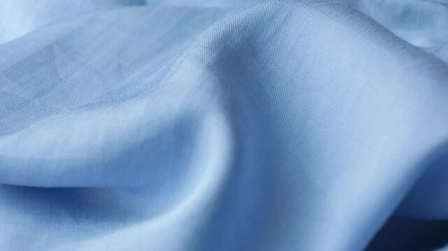 Polyester fabric with a little elastane, macro texture.