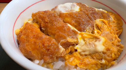 Tonkatsu Don, Crispy pork cutlet over warm Japanese rice, drizzled with savory sauce. A popular and quick Japanese comfort meal.