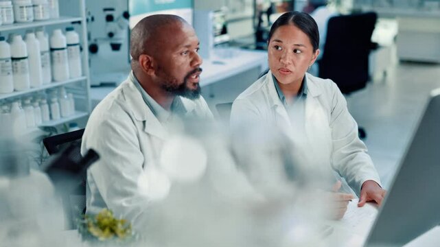 People, scientist and team with computer for science discovery or medical research at laboratory. Man, woman or lab experts with technology for experiment results, discussion or clinic analysis