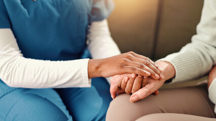 Obraz premium Holding hands, closeup and senior woman with nurse on sofa for comfort, empathy and support. Retirement home, healthcare and caregiver with patient for care, help and compassion in assisted living