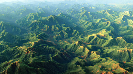 Aerial view of lush green mountains under a clear sky