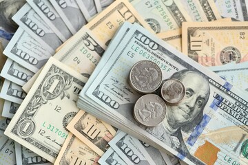 American US dollars money bills and coins close up in big amount