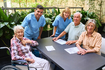 Group Activity with Seniors and Caregivers in a Rehab Facility Setting