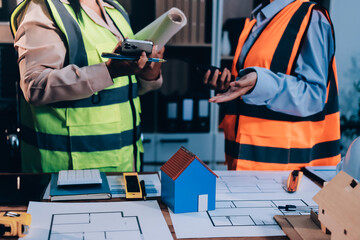 Engineers are helping to design work on blueprints and collaborate on structural analyzing of project types.