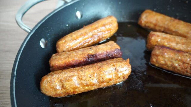 Cevapcici in a pan