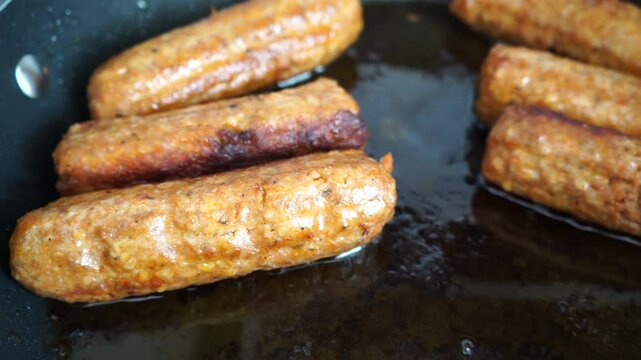 Cevapcici in a pan