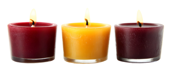 Three colored candles illuminate the darkness, creating a peaceful ambiance