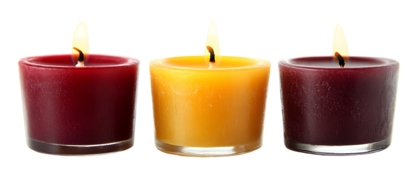 Three colored candles illuminate the darkness, creating a peaceful ambiance - Powered by Adobe