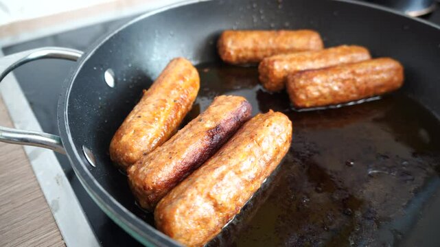 Cevapcici in a pan
