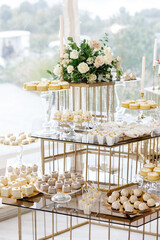 Delicious desserts decorating a wedding reception table