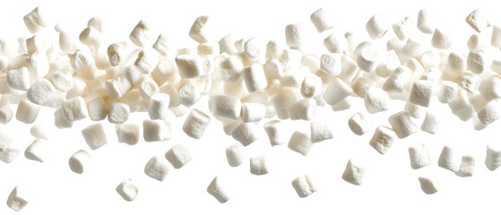 Falling white marshmallows on black background creating a visually appealing effect