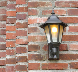 Vintage Old Wall Lamp on Brick Wall
