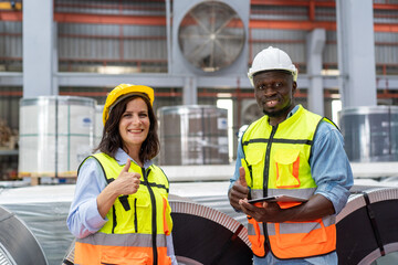 female engineer supervisor advice technician foreman to inspect and check spare part equipment of...