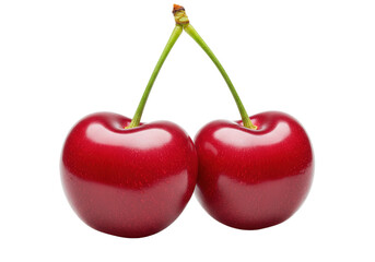 Two red cherries connected by stems isolated against a black background.