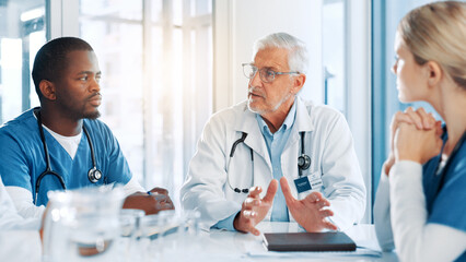 Healthcare, doctor and nurses with discussion in meeting, diagnosis feedback and collaboration. Teamwork, employees and surgeon with talking for medical treatment, planning and training in clinic