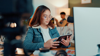 Woman, influencer and research with tablet at office for news, inspiration or design. Female...