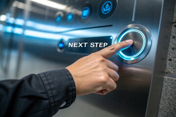 Hand pressing the illuminated button representing the next step forward concept