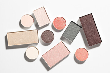 Beautiful eyeshadow refill pans on white background, flat lay