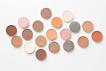 Beautiful eyeshadow refill pans on white background, flat lay