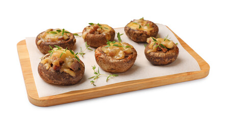 Delicious stuffed mushrooms with melted cheese and thyme isolated on white