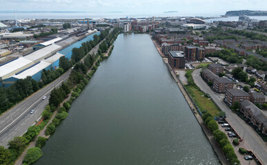 Fototapeta premium Arial view of suburban housing, flats and apartments Bute East Dock Cardiff, South Wales 