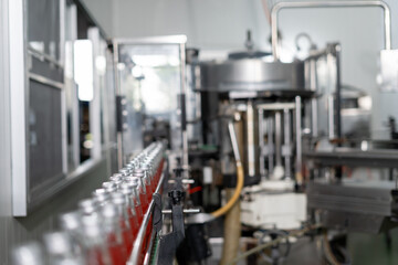 Factory of food or beverages, Conveyor for feed bottle, food or beverages on warehouse before send product to the customer. Quality control or assurance, Good standard